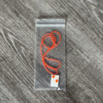 Braillebuchstaben im Legostil / Kette _ Band Neonorange